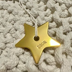 Dior metal star: bag charm/ornament
